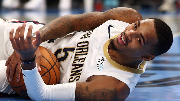 Nov 29, 2024; Memphis, Tennessee, USA; New Orleans Pelicans guard Dejounte Murray (5) reacts as he lays on the floor during the third quarter against the Memphis Grizzlies at FedExForum. Mandatory Credit: Petre Thomas-Imagn Images
