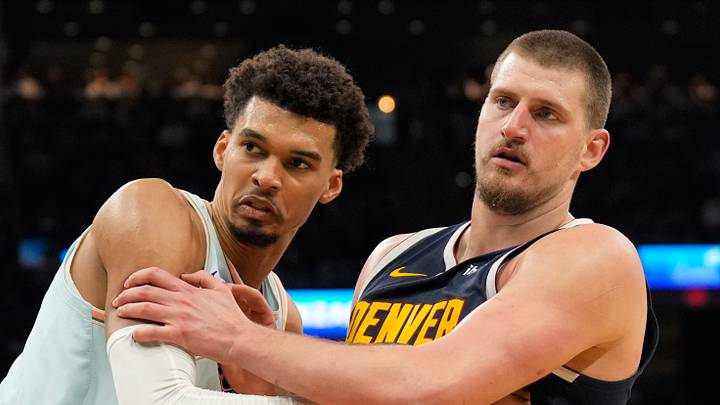 Jan 4, 2025; San Antonio, Texas, USA; San Antonio Spurs center Victor Wembanyama (1) and Denver Nuggets center Nikola Jokic (15) battle for position during an inbound pass in the second half at Frost Bank Center. Mandatory Credit: Scott Wachter-Imagn Images