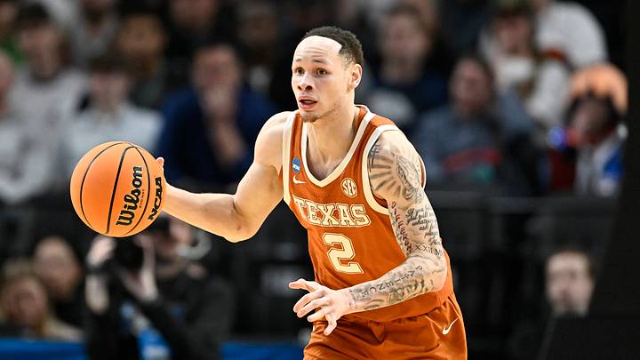Texas Longhorns guard Chendall Weaver dribbles in the first half against the Gonzaga Bulldogs during a second-round game of the men's 2026 NCAA Tournament at Moda Center. Texas Longhorns guard Chendall Weaver dribbles in the first half against the Gonzaga Bulldogs during a second-round game of the men's 2026 NCAA Tournament at Moda Center.
