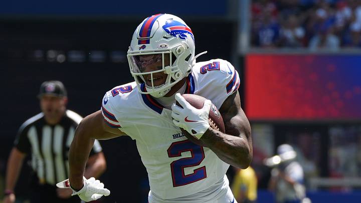 Aug 15, 2026; Orchard Park, New York, USA; Buffalo Bills wide receiver DJ Moore (2) runs with the ball after making a catch against the Carolina Panthers during the first half at New Highmark Stadium. Mandatory Credit: Gregory Fisher-Imagn Images