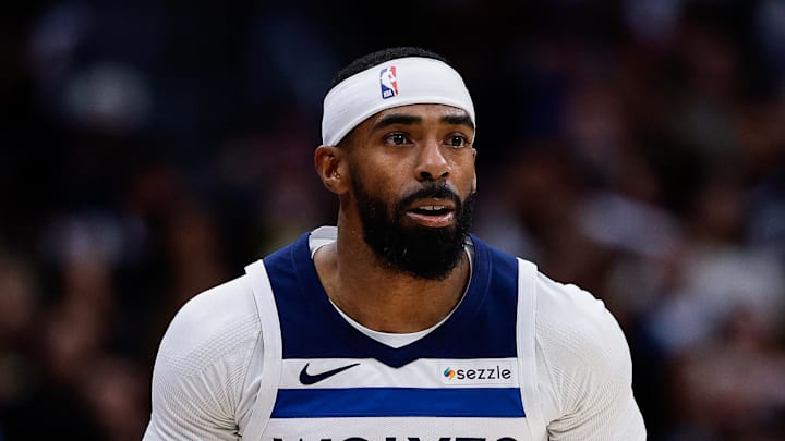Apr 27, 2026; Denver, Colorado, USA; Minnesota Timberwolves guard Mike Conley (10) dribbles the ball up court in the first quarter against the Denver Nuggets during game five of the first round of the 2026 NBA Playoffs at Ball Arena. Mandatory Credit: Isaiah J. Downing-Imagn Images
