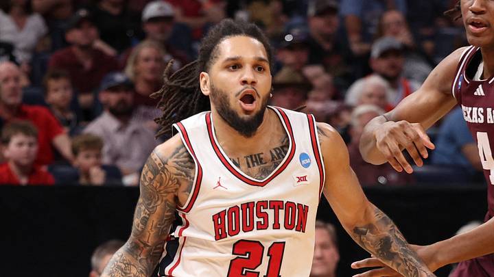 Mar 21, 2026; Oklahoma City, OK, USA; Houston Cougars guard Emanuel Sharp (21) drives to the hoop past Texas A&M Aggies forward Jamie Vinson (4) during the first half of a second round game of the men's 2026 NCAA Tournament at Paycom Center. Mandatory Credit: William Purnell-Imagn Images Mar 21, 2026; Oklahoma City, OK, USA; Houston Cougars guard Emanuel Sharp (21) drives to the hoop past Texas A&M Aggies forward Jamie Vinson (4) during the first half of a second round game of the men's 2026 NCAA Tournament at Paycom Center. Mandatory Credit: William Purnell-Imagn Images