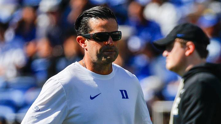 Oct 18, 2025; Durham, North Carolina, USA; Duke Blue Devils head coach Manny Diaz looks on during the warmups of the game against Georgia Tech Yellow Jackets at Wallace Wade Stadium. Mandatory Credit: Jaylynn Nash-Imagn Images Oct 18, 2025; Durham, North Carolina, USA; Duke Blue Devils head coach Manny Diaz looks on during the warmups of the game against Georgia Tech Yellow Jackets at Wallace Wade Stadium. Mandatory Credit: Jaylynn Nash-Imagn Images