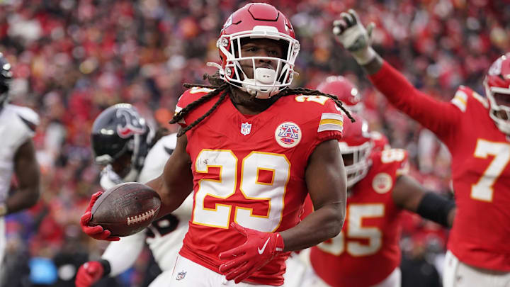 Jan 18, 2025; Kansas City, Missouri, USA; Kansas City Chiefs running back Kareem Hunt (29) carries the ball for a touchdown against the Houston Texans during the second quarter of a 2025 AFC divisional round game at GEHA Field at Arrowhead Stadium. Mandatory Credit: Denny Medley-Imagn Images