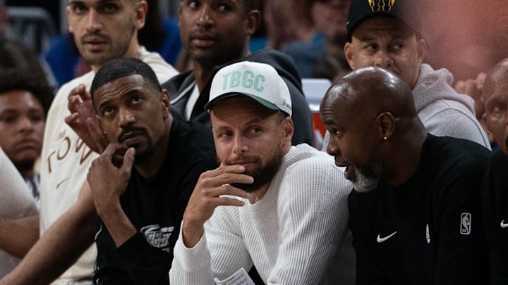Mar 27, 2026; San Francisco, California, USA; Golden State Warriors guard Stephen Curry (30) on the bench watching the fourth quarter against the Washington Wizards at Chase Center. Mandatory Credit: Neville E. Guard-Imagn Images