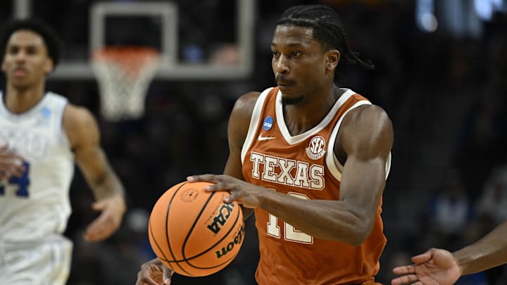 Texas Longhorns guard Tramon Mark drives in the first half against the BYU Cougars during a first round game of the men's 2026 NCAA Tournament at Moda Center. 