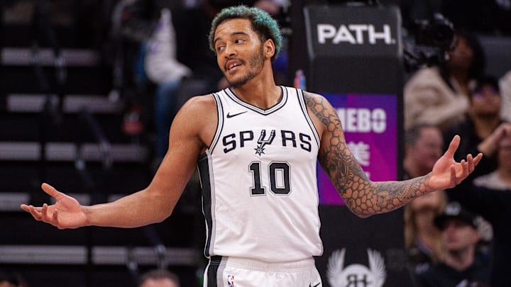 Mar 7, 2025; Sacramento, California, USA; San Antonio Spurs forward Jeremy Sochan (10) argues a call with referee Scott Twardoski (52) during the fourth quarter of the game against the Sacramento Kings at Golden 1 Center. Mandatory Credit: Ed Szczepanski-Imagn Images