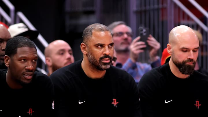 Jan 22, 2025; Houston, Texas, USA; Houston Rockets head coach Ime Udoka (center) on the bench against the Cleveland Cavaliers during the second quarter at Toyota Center. Mandatory Credit: Erik Williams-Imagn Images