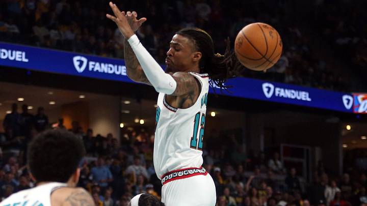 Apr 24, 2025; Memphis, Tennessee, USA; Memphis Grizzlies guard Ja Morant (12) looses control of the ball as he is fouled by Oklahoma City Thunder guard Luguentz Dort (5) during the second quarter during game three for the first round of the 2024 NBA Playoffs at FedExForum. Mandatory Credit: Petre Thomas-Imagn Images Apr 24, 2025; Memphis, Tennessee, USA; Memphis Grizzlies guard Ja Morant (12) looses control of the ball as he is fouled by Oklahoma City Thunder guard Luguentz Dort (5) during the second quarter during game three for the first round of the 2024 NBA Playoffs at FedExForum. Mandatory Credit: Petre Thomas-Imagn Images