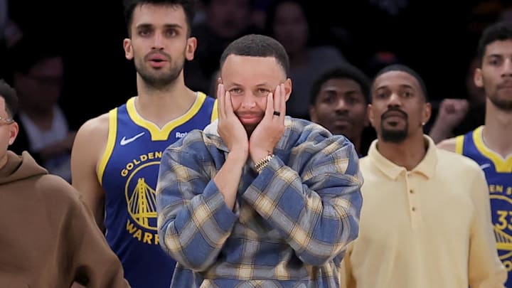 Mar 15, 2026; New York, New York, USA; Golden State Warriors guards Seth Curry (31) and Stephen Curry (30) react during the fourth quarter against the New York Knicks at Madison Square Garden. Mandatory Credit: Brad Penner-Imagn Images
