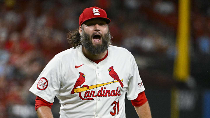 Sep 17, 2024; St. Louis, Missouri, USA;  St. Louis Cardinals starting pitcher Lance Lynn (31) reacts after inning ending double play against the Pittsburgh Pirates during the fifth inning at Busch Stadium.