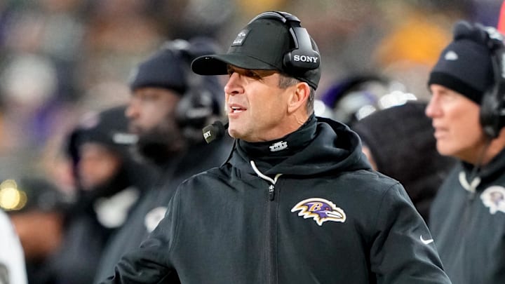 Dec 27, 2025; Green Bay, Wisconsin, USA; Baltimore Ravens head coach John Harbaugh reacts to a play during the first quarter against the Green Bay Packers at Lambeau Field. Mandatory Credit: Jeff Hanisch-Imagn Images Dec 27, 2025; Green Bay, Wisconsin, USA; Baltimore Ravens head coach John Harbaugh reacts to a play during the first quarter against the Green Bay Packers at Lambeau Field. Mandatory Credit: Jeff Hanisch-Imagn Images