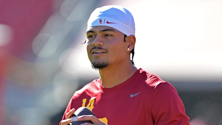 Oct 11, 2025; Los Angeles, California, USA; USC Trojans quarterback Jayden Maiava (14) warms up prior to the game against the Michigan Wolverines at United Airlines Field at the Los Angeles Memorial Coliseum. Mandatory Credit: Jayne Kamin-Oncea-Imagn Images Oct 11, 2025; Los Angeles, California, USA; USC Trojans quarterback Jayden Maiava (14) warms up prior to the game against the Michigan Wolverines at United Airlines Field at the Los Angeles Memorial Coliseum. Mandatory Credit: Jayne Kamin-Oncea-Imagn Images