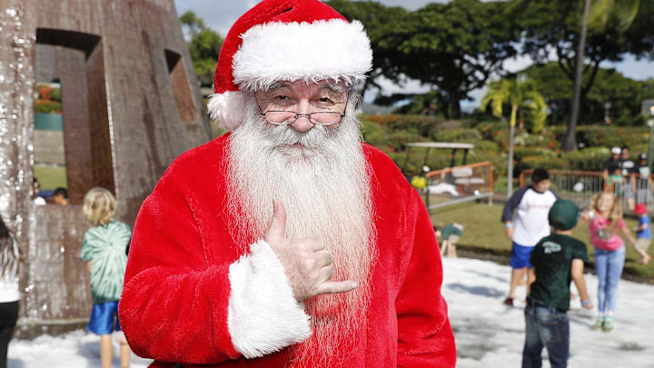 Santa Claus giving the South Carolina football "spurs up" salute.
