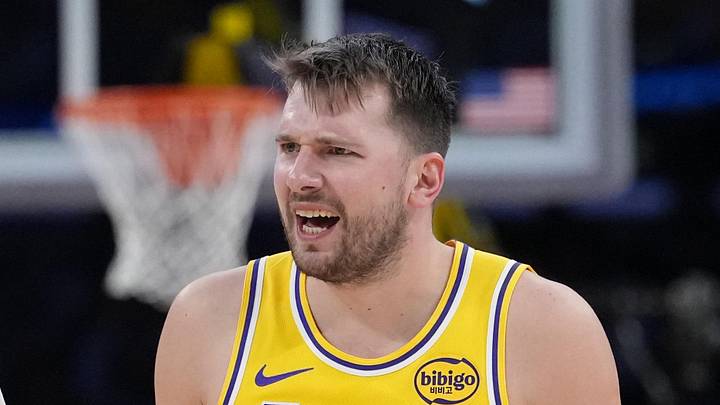 Jan 15, 2026; Los Angeles, California, USA; Los Angeles Lakers forward Jake LaRavia (12) and guard Luka Doncic (77) react against the Charlotte Hornets in the second half at Crypto.com Arena. Mandatory Credit: Kirby Lee-Imagn Images Jan 15, 2026; Los Angeles, California, USA; Los Angeles Lakers forward Jake LaRavia (12) and guard Luka Doncic (77) react against the Charlotte Hornets in the second half at Crypto.com Arena. Mandatory Credit: Kirby Lee-Imagn Images