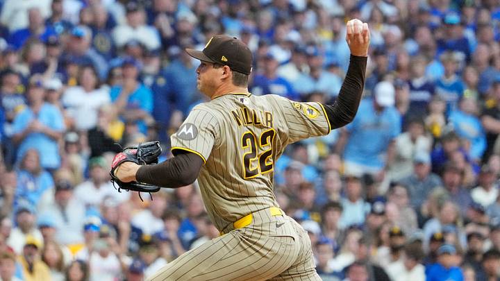 Oct 4, 2026; Milwaukee, Wisconsin, USA; San Diego Padres pitcher Mason Miller (22) throws a pitch during the eighth inning against the Milwaukee Brewers in game two of the NLDS for the 2026 MLB Playoffs at American Family Field. Mandatory Credit: Michael McLoone-Imagn Images Oct 4, 2026; Milwaukee, Wisconsin, USA; San Diego Padres pitcher Mason Miller (22) throws a pitch during the eighth inning against the Milwaukee Brewers in game two of the NLDS for the 2026 MLB Playoffs at American Family Field. Mandatory Credit: Michael McLoone-Imagn Images