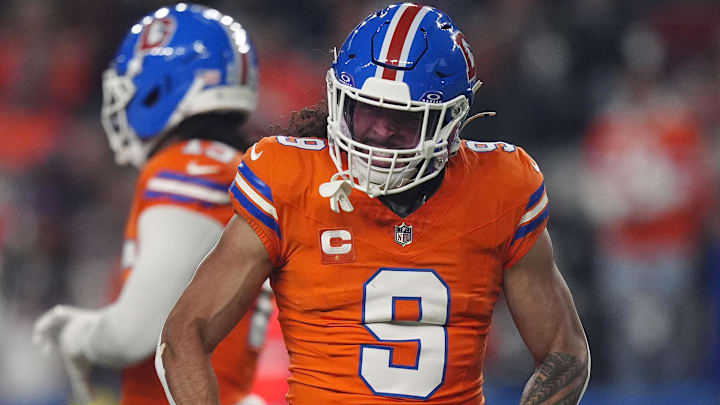 Nov 6, 2025; Denver, Colorado, USA; Denver Broncos safety Talanoa Hufanga (9) reacts against the Las Vegas Raiders during the first half at Empower Field at Mile High. 