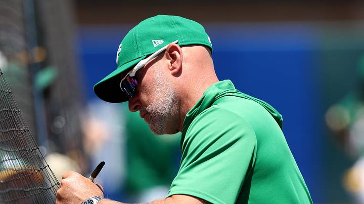 Jul 5, 2026; West Sacramento, California, USA; Athletics manager Mark Kotsay (7) signs a ball for a baseball fan before the start of a game against the Miami Marlins at Sutter Health Park. Mandatory Credit: Dennis Lee-Imagn Images Jul 5, 2026; West Sacramento, California, USA; Athletics manager Mark Kotsay (7) signs a ball for a baseball fan before the start of a game against the Miami Marlins at Sutter Health Park. Mandatory Credit: Dennis Lee-Imagn Images