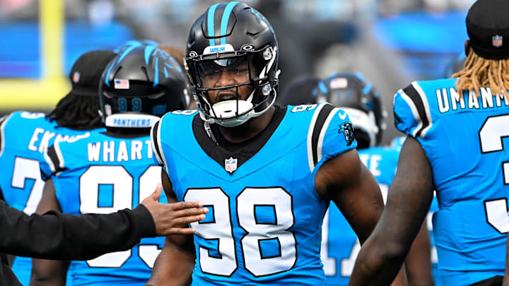 Oct 26, 2025; Charlotte, North Carolina, USA; Carolina Panthers linebacker D.J. Wonnum (98) runs on to the field before the game at Bank of America Stadium. Mandatory Credit: Bob Donnan-Imagn Images Oct 26, 2025; Charlotte, North Carolina, USA; Carolina Panthers linebacker D.J. Wonnum (98) runs on to the field before the game at Bank of America Stadium. Mandatory Credit: Bob Donnan-Imagn Images