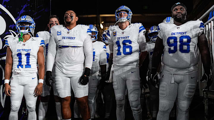 From left, Detroit Lions wide receiver Kalif Raymond (11), right tackle Penei Sewell (58), quarterback Jared Goff (16), and defensive tackle DJ Reader (98) get ready to take the field for the first half against the Baltimore Ravens at M&T Bank Stadium in Baltimore, Md., on Monday, Sept. 22, 2025.