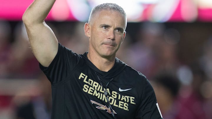 Florida State Seminoles head coach Mike Norvell walks down the field. The Miami Hurricanes lead the Florida State Seminoles 14-3 at the half on Saturday, Oct. 4, 2025.