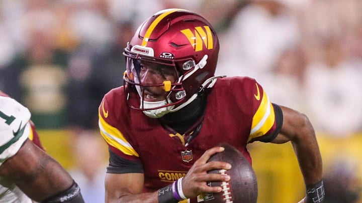 Washington Commanders quarterback Jayden Daniels (5).