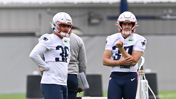 Jun 9, 2025; Foxborough, MA, USA; New England Patriots place kicker Andres Borregales (36) and New England Patriots place kicker John Parker Romo (37) wait for the start of a drill during minicamp at Gillette Stadium. Mandatory Credit: Eric Canha-Imagn Images Jun 9, 2025; Foxborough, MA, USA; New England Patriots place kicker Andres Borregales (36) and New England Patriots place kicker John Parker Romo (37) wait for the start of a drill during minicamp at Gillette Stadium. Mandatory Credit: Eric Canha-Imagn Images
