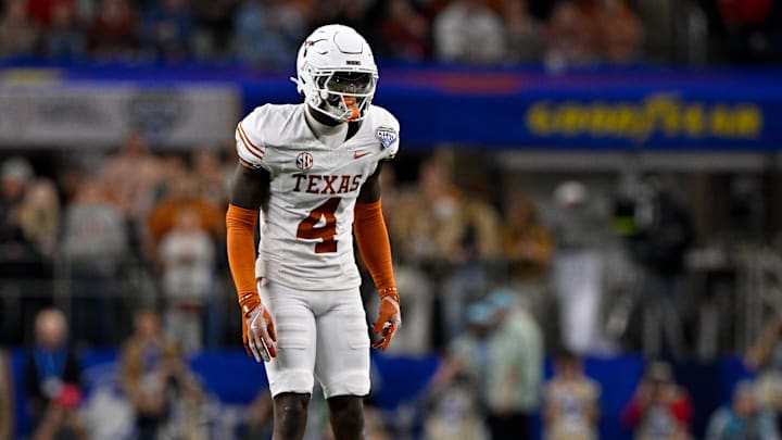 Jan 10, 2025; Arlington, TX, USA; Texas Longhorns defensive back Andrew Mukuba (4) in action during the game between the Texas Longhorns and the Ohio State Buckeyes at AT&T Stadium.