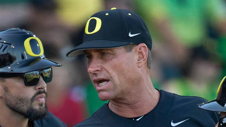 Oregon head coach Mark Wasikowski, center, brings his team together in the 8th inning against Oral Roberts during the NCAA Super Regional at PK Park in Eugene Sunday, June 11, 2023. Oregon head coach Mark Wasikowski, center, brings his team together in the 8th inning against Oral Roberts during the NCAA Super Regional at PK Park in Eugene Sunday, June 11, 2023.