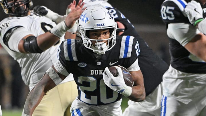 Nov 29, 2025; Durham, North Carolina, USA; Duke Blue Devils running back Nate Sheppard (20) runs the ball against the Wake Forest Demon Deacons during the fourth quarter at Wallace Wade Stadium. Mandatory Credit: Zachary Taft-Imagn Images Nov 29, 2025; Durham, North Carolina, USA; Duke Blue Devils running back Nate Sheppard (20) runs the ball against the Wake Forest Demon Deacons during the fourth quarter at Wallace Wade Stadium. Mandatory Credit: Zachary Taft-Imagn Images