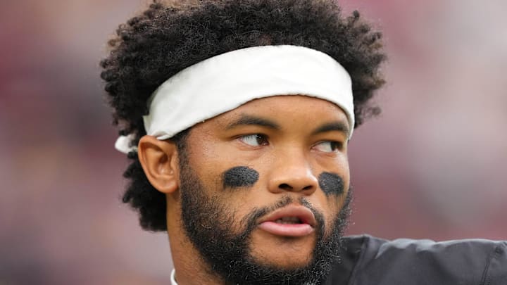 Oct 5, 2025; Glendale, Arizona, USA; Arizona Cardinals quarterback Kyler Murray (1) warms up before their game against the Tennessee Titans at State Farm Stadium. Mandatory Credit: Joe Camporeale-Imagn Images