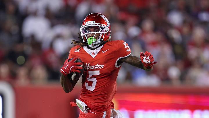 Sep 12, 2025; Houston, Texas, USA; Houston Cougars wide receiver Stephon Johnson (5) runs with the ball during the third quarter against the Colorado Buffaloes at TDECU Stadium. Mandatory Credit: Troy Taormina-Imagn Images Sep 12, 2025; Houston, Texas, USA; Houston Cougars wide receiver Stephon Johnson (5) runs with the ball during the third quarter against the Colorado Buffaloes at TDECU Stadium. Mandatory Credit: Troy Taormina-Imagn Images