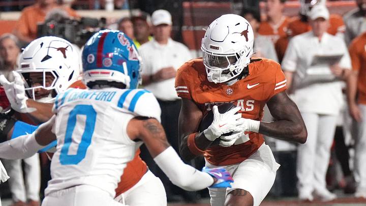 Texas Longhorns running back Michael Terry III (11) scores on a rushing touchdown during the first half against the Mississippi Rebels at Darrell K Royal-Texas Memorial Stadium. Texas Longhorns running back Michael Terry III (11) scores on a rushing touchdown during the first half against the Mississippi Rebels at Darrell K Royal-Texas Memorial Stadium.