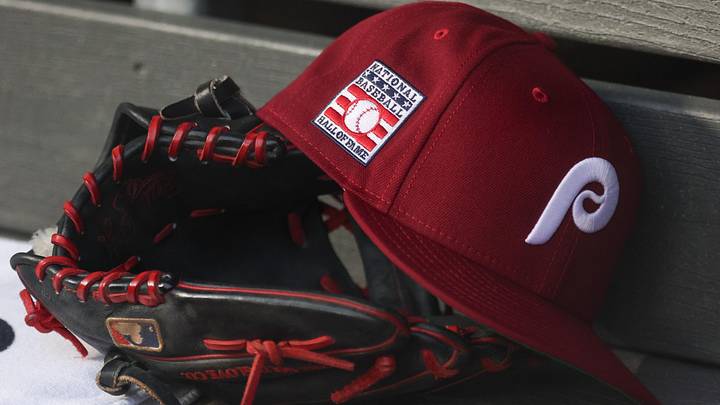 Jul 25, 2025; Bronx, New York, USA; A detailed view of a Hall of Fame patch on a Philadelphia Phillies hat resting in the dugout during the second inning against the New York Yankees at Yankee Stadium. Jul 25, 2025; Bronx, New York, USA; A detailed view of a Hall of Fame patch on a Philadelphia Phillies hat resting in the dugout during the second inning against the New York Yankees at Yankee Stadium.