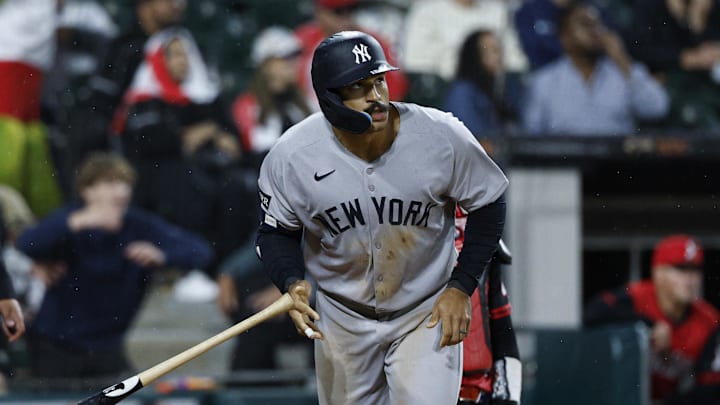 Aug 29, 2025; Chicago, Illinois, USA; New York Yankees center fielder Trent Grisham (12) watches his grand slam against the Chicago White Sox during the fourth inning at Rate Field. Mandatory Credit: Kamil Krzaczynski-Imagn Images