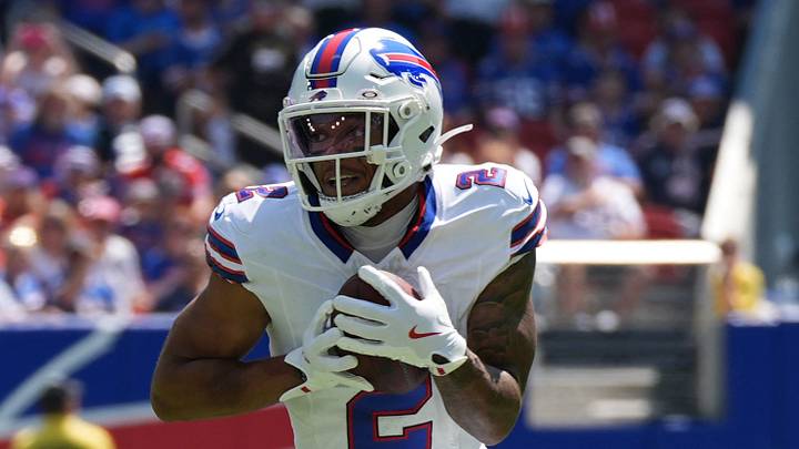 Aug 15, 2026; Orchard Park, New York, USA; Buffalo Bills wide receiver DJ Moore (2) runs with the ball after making a catch aginst the Carolina Panthers during the first half at New Highmark Stadium. Mandatory Credit: Gregory Fisher-Imagn Images