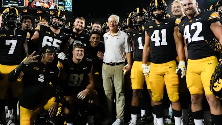 Iowa Hawkeyes head coach Kirk Ferentz celebrates with his players after becoming the winningest coach in Big Ten history, passing Woody Hayes, with a win over the Massachusetts Minutemen Sept. 13, 2025 at Kinnick Stadium in Iowa City, Iowa.
