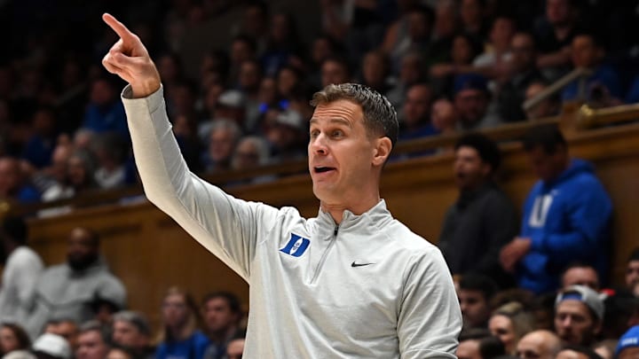 Nov 21, 2025; Durham, North Carolina, USA; Duke Blue Devils head coach Jon Scheyer directs his team during the second half against the Niagara Purple Eagles at Cameron Indoor Stadium. Mandatory Credit: Rob Kinnan-Imagn Images