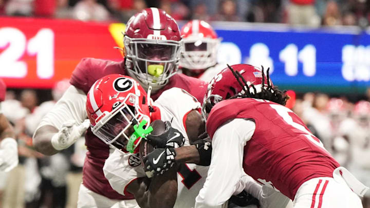 Dec 6, 2025; Atlanta, GA, USA; Georgia Bulldogs wide receiver Zachariah Branch (1) scores a touchdown during the fourth quarter against the Alabama Crimson Tide during the 2025 SEC Championship game at Mercedes-Benz Stadium. 