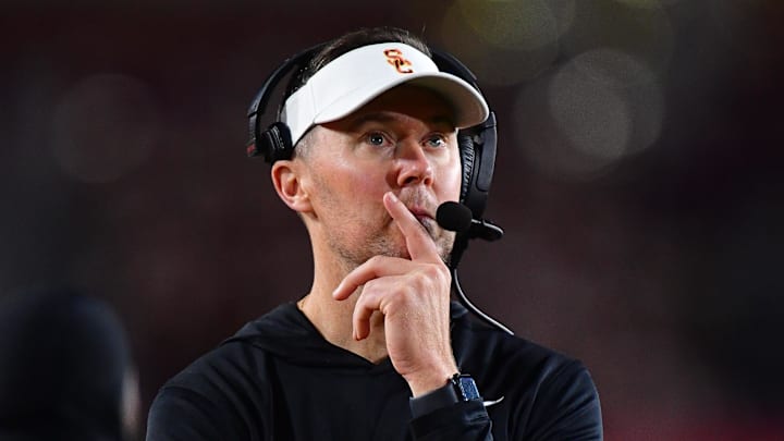 Nov 7, 2025; Los Angeles, California, USA; Southern California Trojans head coach Lincoln Riley watches game action against the Northwestern Wildcats during the second half at the Los Angeles Memorial Coliseum. Mandatory Credit: Gary A. Vasquez-Imagn Images