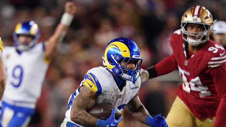 Dec 12, 2024; Santa Clara, California, USA; Los Angeles Rams running back Kyren Williams (23) runs past San Francisco 49ers defensive end Yetur Gross-Matos (94) in the fourth quarter at Levi's Stadium. Mandatory Credit: Cary Edmondson-Imagn Images Dec 12, 2024; Santa Clara, California, USA; Los Angeles Rams running back Kyren Williams (23) runs past San Francisco 49ers defensive end Yetur Gross-Matos (94) in the fourth quarter at Levi's Stadium. Mandatory Credit: Cary Edmondson-Imagn Images