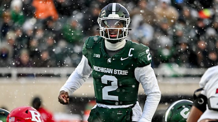 Michigan State's Aidan Chiles prepares to snap the ball against Rutgers during the second quarter on Saturday, Nov. 30, 2024, at Spartan Stadium in East Lansing. Michigan State's Aidan Chiles prepares to snap the ball against Rutgers during the second quarter on Saturday, Nov. 30, 2024, at Spartan Stadium in East Lansing.