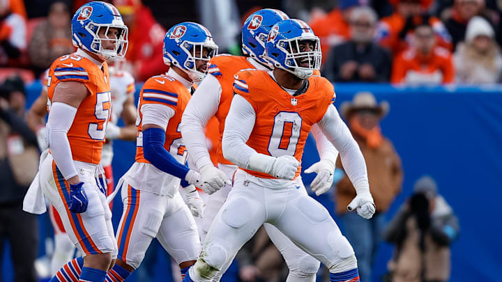 Jan 5, 2025; Denver, Colorado, USA; Denver Broncos linebacker Jonathon Cooper (0) reacts ahead of teammates after a sack in the second quarter against the Kansas City Chiefs at Empower Field at Mile High. Jan 5, 2025; Denver, Colorado, USA; Denver Broncos linebacker Jonathon Cooper (0) reacts ahead of teammates after a sack in the second quarter against the Kansas City Chiefs at Empower Field at Mile High.