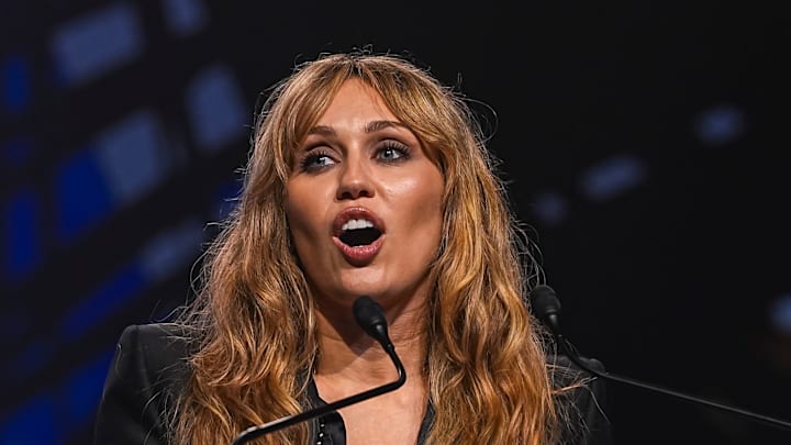 Singer and songwriter Miley Cyrus gives a speech