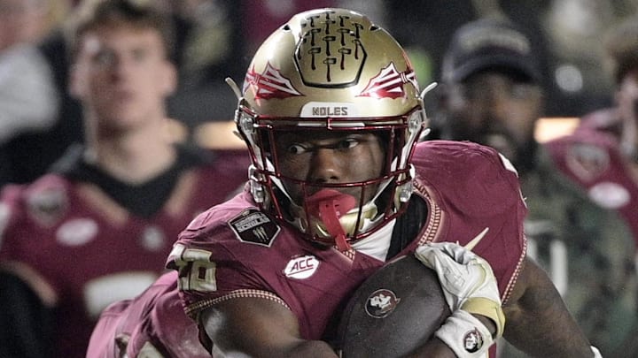 Nov 15, 2025; Tallahassee, Florida, USA; Florida State Seminoles running back Samuel Singleton (28) runs the ball during the second half against the Virginia Tech Hokies at Doak S. Campbell Stadium. Mandatory Credit: Melina Myers-Imagn Images Nov 15, 2025; Tallahassee, Florida, USA; Florida State Seminoles running back Samuel Singleton (28) runs the ball during the second half against the Virginia Tech Hokies at Doak S. Campbell Stadium. Mandatory Credit: Melina Myers-Imagn Images