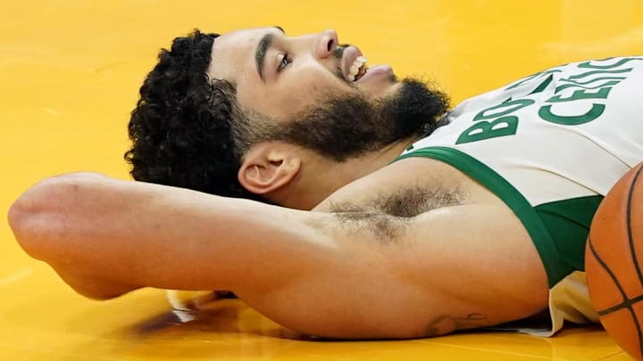Feb 2, 2021; San Francisco, California, USA; Boston Celtics forward Jayson Tatum (0) smiles after gaining possession of the ball and calling timeout during the fourth quarter against the Golden State Warriors at Chase Center. Mandatory Credit: Darren Yamashita-Imagn Images