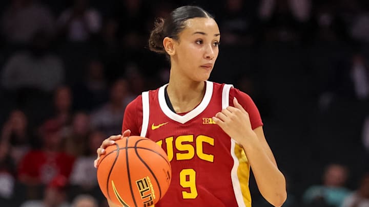 Nov 9, 2025; Charlotte, North Carolina, USA; Southern California Trojans guard Jazzy Davidson (9) dribbles the ball against the NC State Wolfpack during the third quarter of the Ally Tipoff game at Spectrum Center. Mandatory Credit: Cory Knowlton-Imagn Images