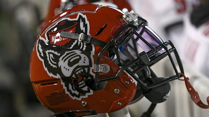 Nov 13, 2021; Winston-Salem, North Carolina, USA; A North Carolina State Wolfpack helmet seen on the sideline during the second half against the Wake Forest Demon Deacons at Truist Field. Mandatory Credit: William Howard-Imagn Images