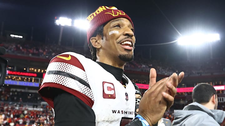 Jan 12, 2025; Tampa, Florida, USA; Washington Commanders quarterback Jayden Daniels (5) celebrates after winning a NFC wild card playoff against the Tampa Bay Buccaneers at Raymond James Stadium. Mandatory Credit: Kim Klement Neitzel-Imagn Images Jan 12, 2025; Tampa, Florida, USA; Washington Commanders quarterback Jayden Daniels (5) celebrates after winning a NFC wild card playoff against the Tampa Bay Buccaneers at Raymond James Stadium. Mandatory Credit: Kim Klement Neitzel-Imagn Images