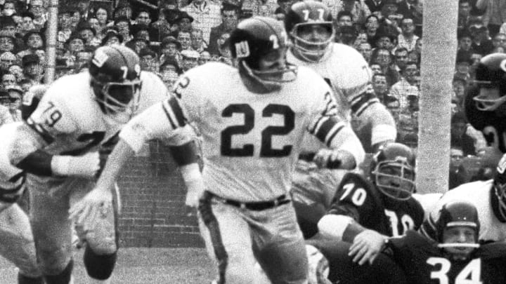 Dec 2, 1962; Chicago, IL, USA; FILE PHOTO; New York Giants cornerback Dick Lynch (22) in action against the Chicago Bears at Wrigley Field. The Giants defeated the Bears 26-24. Dec 2, 1962; Chicago, IL, USA; FILE PHOTO; New York Giants cornerback Dick Lynch (22) in action against the Chicago Bears at Wrigley Field. The Giants defeated the Bears 26-24.